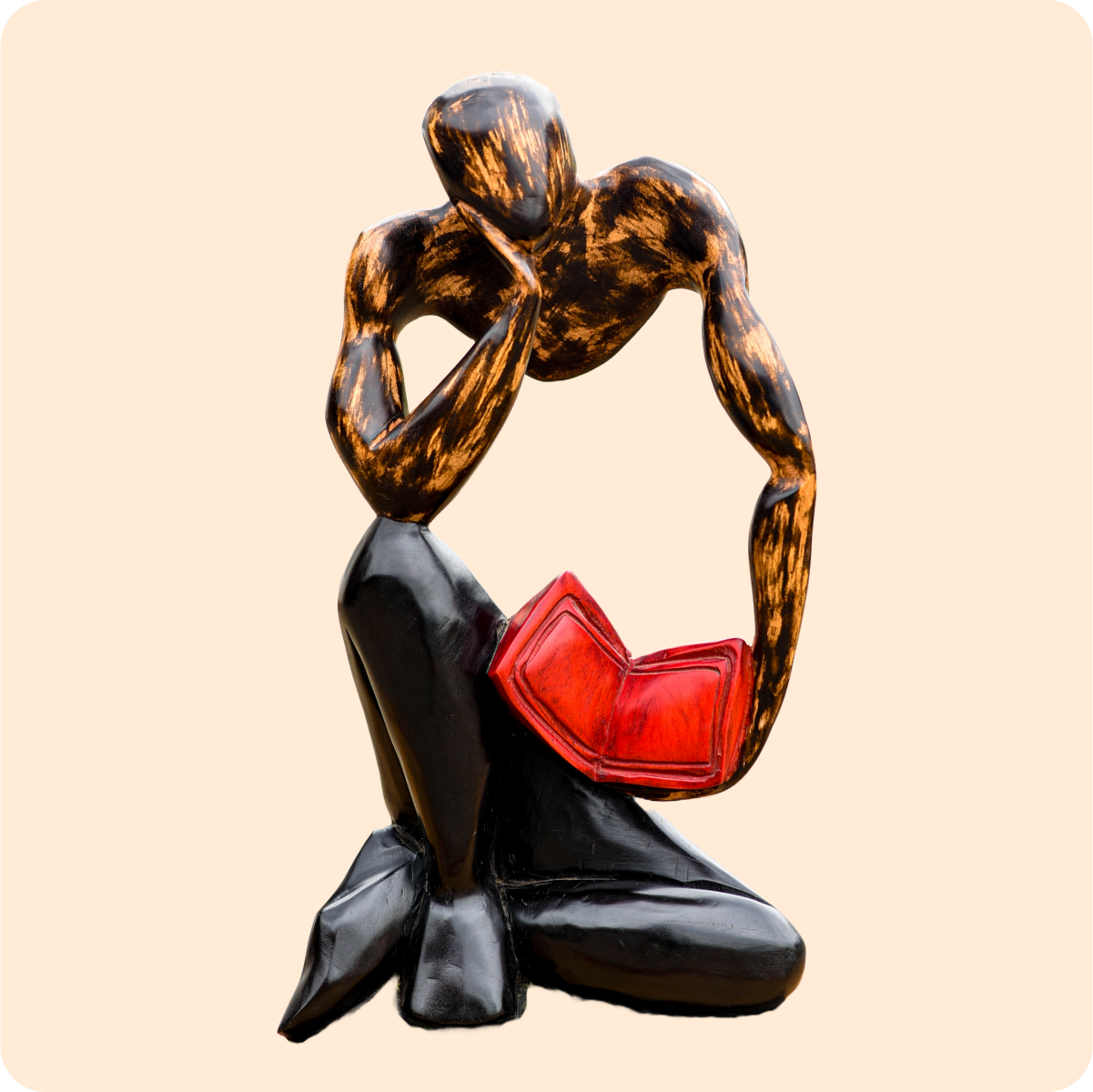 Carved Sculpture Of A Thinking Man With Book